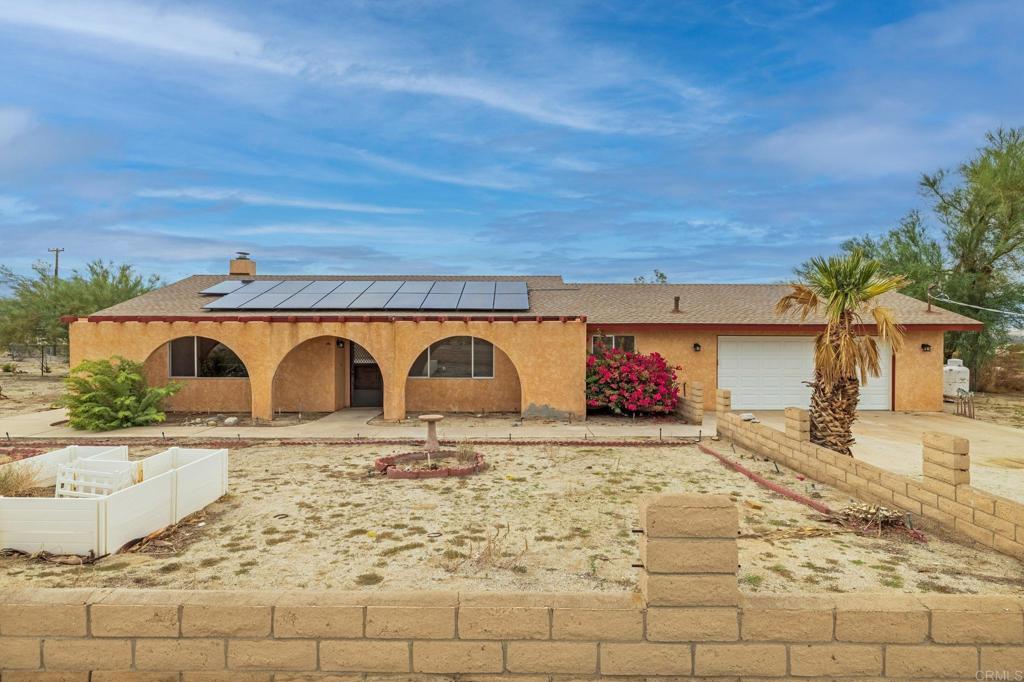 Nestled on a spacious half acre corner lot, this inviting home blends classic charm and modern efficiency. The interior has been freshly painted and recent upgrades include a new roof and HVAC system. A leased solar keeps energy costs low. With its generous lot size, this property offers plenty of room for outdoor living, gardening, or future expansion. Situated in northeast San Diego County, Borrego Springs is celebrated for its spring wildflower bloom, small town charm, and is California's first International Dark Sky Community.