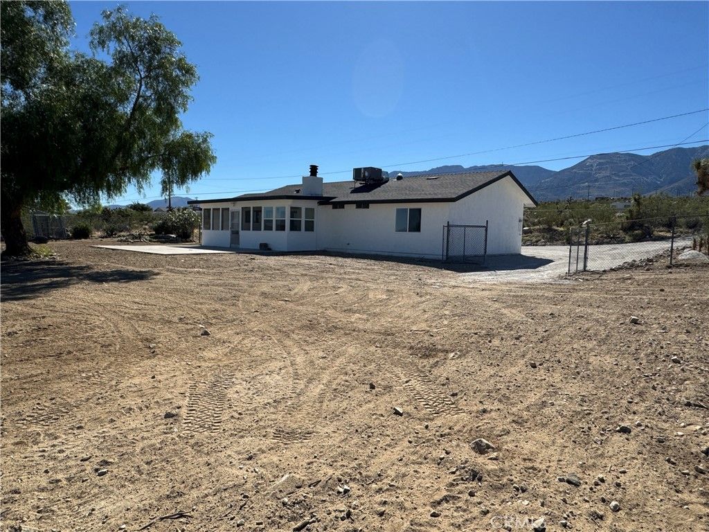 Photo of 32358 Emerald Rd, Lucerne Valley, CA 92356 (MLS # HD26014609)