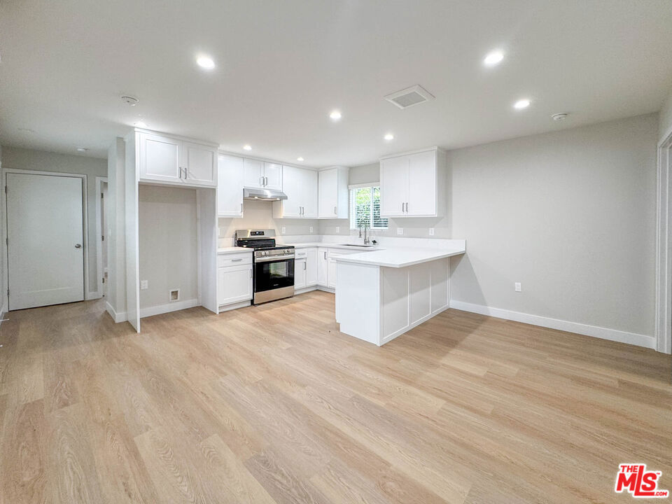 Brand new ADU units; downstairs 2BD + 2 BA offers stylish, modern living in the highly sought-after Belmont Heights neighborhood. Featuring a spacious and functional layout, the unit includes two large bedrooms with ample closet space. The primary bedroom has its own private en-suite bathroom, while the second full bathroom is conveniently located off the hallway. The home boasts luxury vinyl plank flooring throughout and a fully updated kitchen with white shaker cabinets, quartz countertops, and stainless steel appliances - including a stove and dishwasher. The open floor plan places the living room between the two bedrooms for added privacy. Additional features include an in-unit stacked washer and dryer in the hall closet. All Utilities are paid by the tenant except water, 1 parking space, Pet-friendly with additional monthly pet rent.