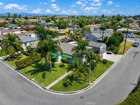 Photo of 8734 Parrot Avenue, Downey, CA 90240 (MLS # MB26103756)
