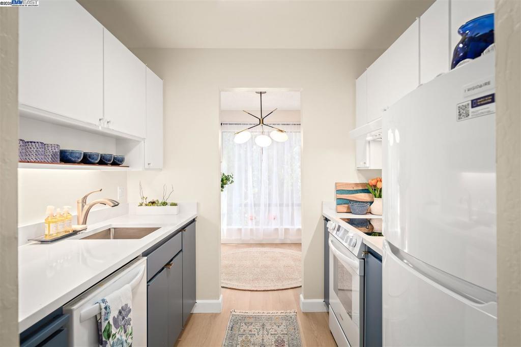 Charming Top-Floor Remodeled Condo in Prime Walnut Creek Location (94596) Welcome to this beautifully remodeled 1-bedroom, 1-bath condo, ideally situated on the top floor of a desirable building in the heart of Walnut Creek. With no neighbors above and only two units below. Step inside to discover brand-new flooring, sleek countertops, and modern appliances—all thoughtfully updated to create a stylish and move-in-ready space. Just bring your personal touches and make it your own! Live the resort-style lifestyle with access to an array of amenities, including swimming pools, tennis courts, a state-of-the-art fitness center, and a welcoming clubhouse. Located in the coveted 94596 zip code, this home also benefits from top-rated schools and a vibrant, well-maintained neighborhood. Outdoor lovers will appreciate the close proximity to the Iron Horse Regional Trail, Contra Costa Canal Trail, and the scenic paths of Shell Ridge Open Space. Commuters will find quick access to both Walnut Creek and Pleasant Hill BART stations, major freeways, and a direct route to San Francisco. Best of all, you're just minutes from Walnut Creek’s premier shopping, dining, and cultural attractions. Don’t miss this incredible opportunity—schedule your visit today. Your new home awaits!