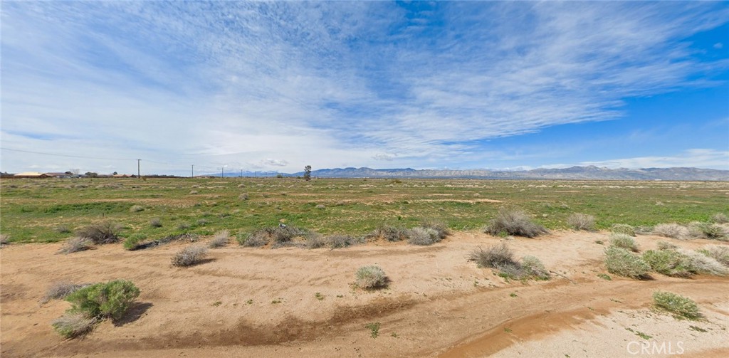 Secure this 0.17-acre residential opportunity on Rusche Boulevard in California City's growing desert community. This flat, buildable parcel offers direct dirt road access with electricity connection available approximately 450 feet away near Mendiburu Road. Located just 4 miles from California City Airport in Kern County's designated opportunity zone, the property provides tax advantages and affordable entry into California's land market at $19,900. The level terrain with typical desert vegetation eliminates grading costs while maintaining privacy in the high-desert landscape. Zoning supports residential development with minimal restrictions, making it ideal for off-grid living, recreational retreat, or long-term investment. Proximity to State Route 14 ensures connectivity to Los Angeles metropolitan area while preserving javascript:__doPostBack('m_rpPageList$ctl06$lbPageLink','')rural character. California City's 203-square-mile expanse offers room for growth, supported by State Water Project infrastructure and Southern California Edison service territory. The region attracts outdoor enthusiasts with nearby Red Rock Canyon State Park and Joshua Tree National Park access. Buyer to verify utilities and conduct due diligence. Perfect for those seeking affordable California land with development potential in an area positioned for future appreciation as remote work trends drive desert migration. APN 229-103-17-00-7.
