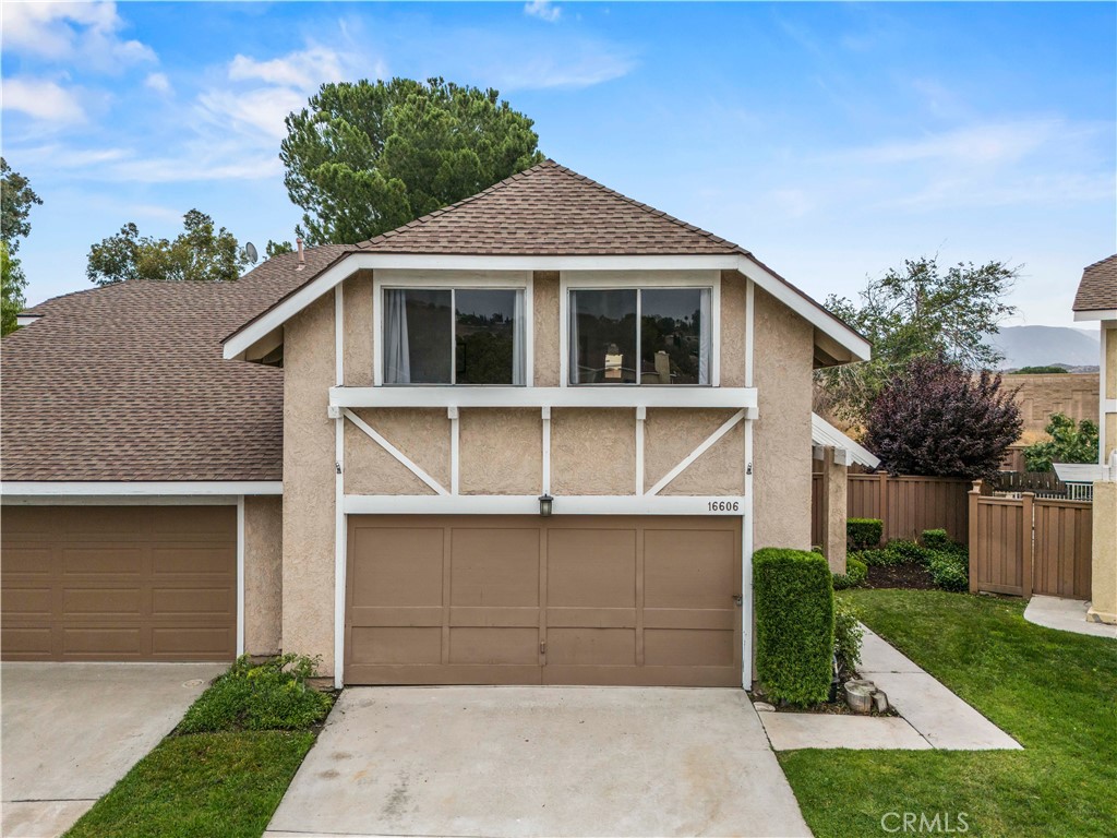 Welcome to this beautifully remodeled 4-bedroom, 2-bathroom townhome at the end of the cul-de-sac that has just been beautifully remodeled with fresh, modern updates throughout! The moment you step inside, you’re greeted with stunning, newer wood-like flooring in the spacious living room that features a ceiling fan and fireplace and flows seamlessly into your remarkable kitchen, thoughtfully designed with newer quartz countertops, stylish beige cabinetry accented by matte black hardware, sleek stainless steel appliances, newer single-basin sink with a modern commercial style faucet, a pantry, and recessed lighting that brings the whole space to life. Downstairs, you also have one bedroom and a three quarter bathroom with two sinks and walk-in shower—perfect as a downstairs primary primary suite or serving family and live-in guests. Upstairs you’ll find your 3 additional bedrooms and a full bath with one of those bedrooms that stands out with its massive space providing endless possibilities as a game room, theater room, play room, home office, etc., and it even includes a spacious walk-in closet offering flexibility and convenience. Freshly laid sod completes your large and spacious backyard and side yard with no rear neighbors! You’re just a short walk away from some of the HOA amenities including a pool, spa, tennis court, and basketball court—everything you need to stay active and unwind. Not to mention, you're close to lots of shopping, dining, and the 14 freeway. Don’t miss the chance to own this upgraded, move-in ready townhome in a well-maintained community with fantastic amenities. Schedule your showing today and make this gem your own!