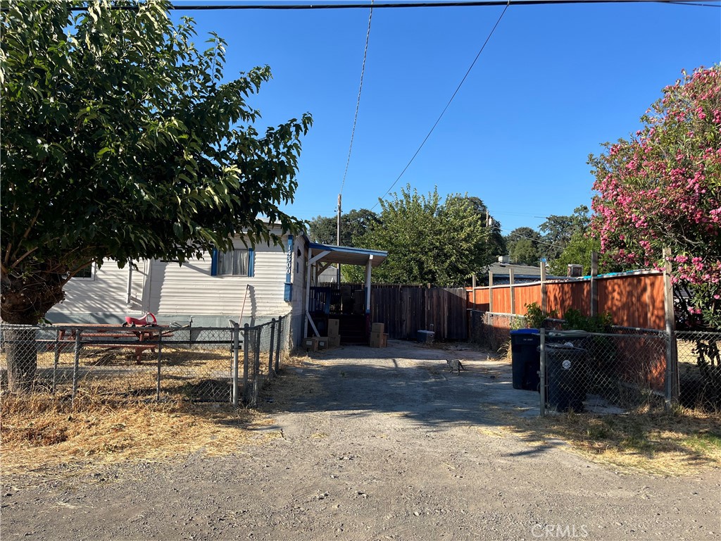 3BR/1BA mobile home on land sits close to Highlands Park in the heart of Clearlake. Includes 433a foundation and is just minutes from the lake. Fully fenced lot with mature shade trees for privacy, backyard with storage shed, and off-street parking. Includes washer & dryer. Owner financing is available! Please drive by first to determine interest before requesting a showing. Do not disturb tenants—interior showings arranged for qualified buyers only.