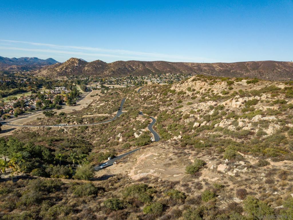 Discover this unique 8+ acre hilltop property located in the heart of San Diego Country Estates—without the constraints of the SDCE HOA. This exceptional parcel offers a rare opportunity to build your dream home in a serene, elevated setting. Tucked behind a gated entrance shared by only three other properties, it provides an added sense of privacy and security—an ideal retreat in today’s uncertain times. Come walk the land and envision the possibilities for your forever home.
