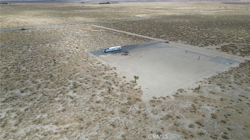 Great opportunity to own a spacious 2.6-acre flat lot in Los Angeles County! This parcel is offering a wide range of possibilities for future use. Located approximately about 220 yards from paved Avenue K, the property provides easy access while still offering the peace and privacy of open land. With endless desert views and plenty of space to create your vision, this parcel is ideal for investment, future development, or personal enjoyment. This is an excellent parcel to add to your land portfolio.