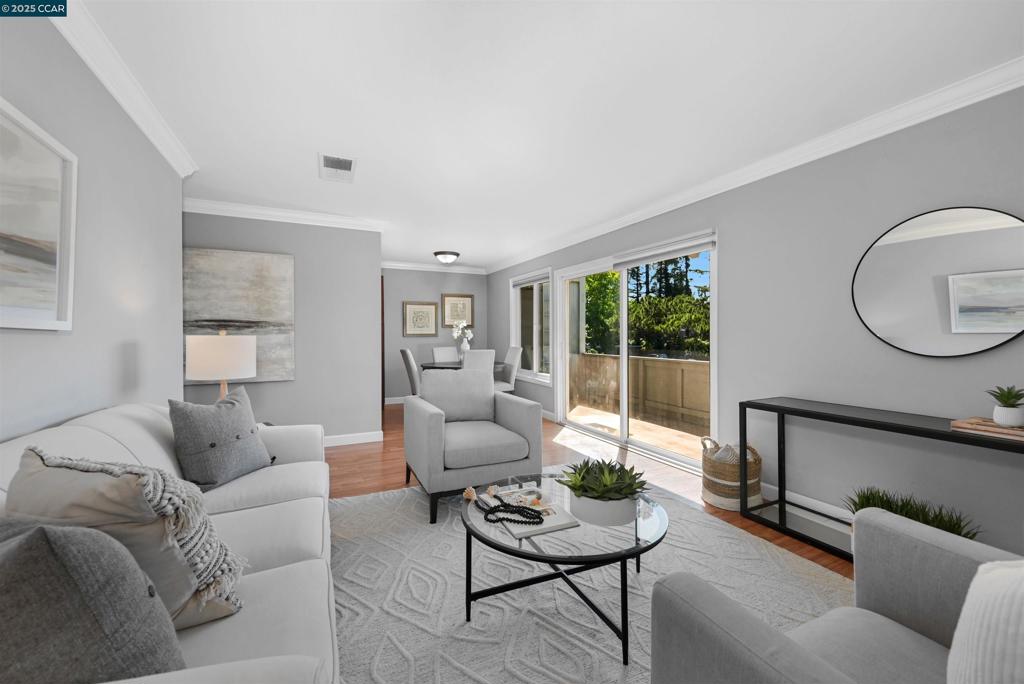 Sunny and spacious 2 bedroom, 1 bath condo near the Walnut Creek border. Enjoy Mt. Diablo views and relax outside on your private balcony of this upper level unit. An inviting floor plan that features an updated kitchen, laminate flooring in the generous living room and dining room & crown and baseboard molding. The thoughtful layout ensures privacy and functionality, making it ideal for a variety of lifestyles. Conveniently located close to shopping, restaurants, BART and medical offices. Covered parking spot, ample guest parking and access to the community pool & clubhouse.