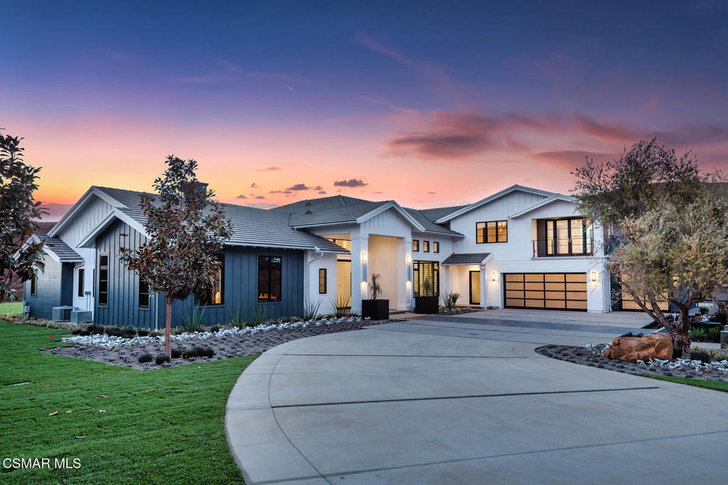 ABSOLUTELY EPIC newer built contemporary farmhouse with a premier cul-de-sac location in upper North Ranch! Privately gated trophy estate on over two acres with mountain views! No expense was spared to create this true masterpiece! Livable as mostly one level, this amazing open concept floor plan spans over 7000 square feet. Features include a grand 'great room' with 10 foot multi-slide Fleetwood glass doors, floor to ceiling stone fireplace and a beautifully designed soaring ceiling with wood accents. There is also a separate theater/bonus room (possible 6th bedroom), two sided glass wine cellar, walk in wet bar and so much more!, Up the floating stairs you will find an additional family room and two large secondary en-suite bedrooms, one of which serves as a second primary suite option. Perfect for guest quarters! The home is elevator ready if desired. The main level primary suite is extraordinary. There are two large walk in closets, tremendous fireplace, sitting room and a Four Seasons quality bathroom with steam shower and soaker tub. The resort quality grounds are second to none. There is a 90 foot infinity pool enhanced by fire & water features. There is also 1300 square feet of covered outdoor living, barbecue center and massive manicured lawns. Other amenities include a smart home and solar systems, FIVE car garage, Sonos sound, security cameras, large glass pivot front door and so much more. A very exciting estate to hit North Ranch.