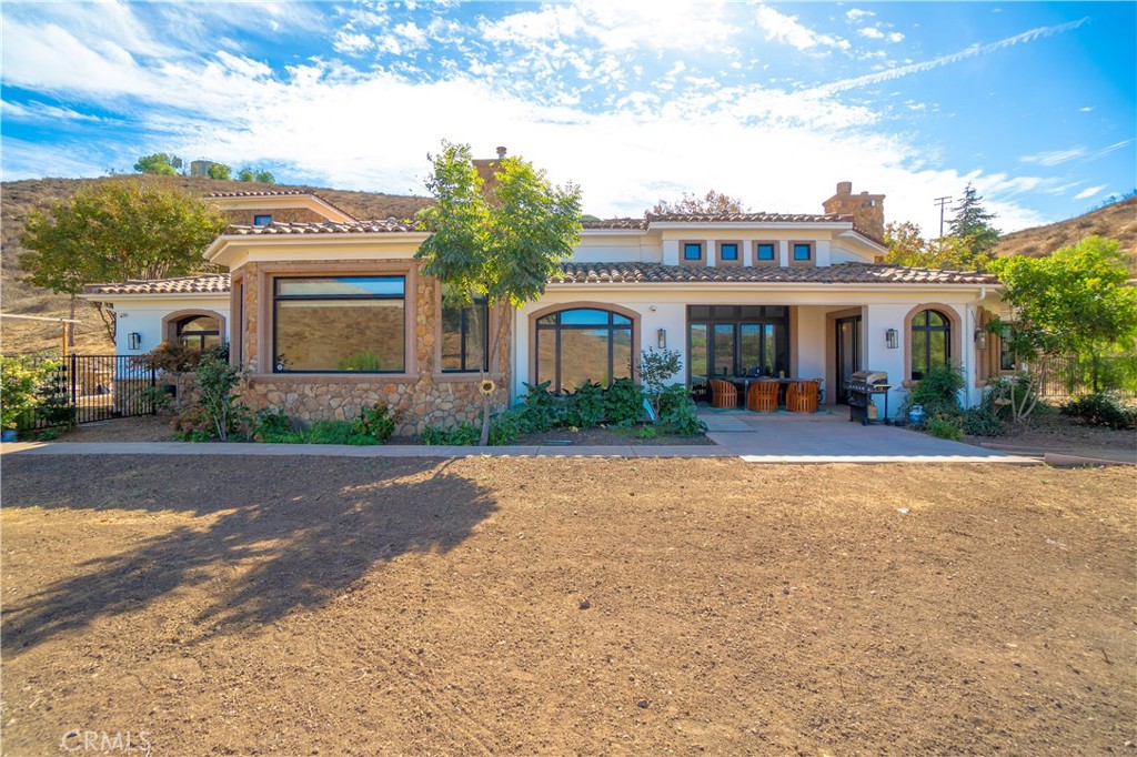 Premiere Estates Auction Company 877-337-8283 x 106 Easy to show. And a must to see! Make an offer! Easy to show !World bid Auction on behalf of the Court – Qualifying round sealed bids due no later than August 11, 2025 Noon. Bidders within the top 50% by price will be notified to submit the Final sealed bid on August 12th. The Successful Bidder will be notified on August 12th no later than 3pm they have been awarded the Property. Buyer’s may obtain financing, though financing is not a contingency to close. Proof of funds to close and/or a lender’s approval letter are required with your bid. Welcome to a breathtaking sprawling Spanish estate that epitomizes luxury and tranquility, perfectly nestled on over 50 acres of prime Thousand Oaks agricultural land. This exceptional property features 5 spacious bedrooms and 5 1/2 baths, offering ample room for family and guests. With approximately 4,500 square feet of beautifully designed living space, the home combines classic Spanish architecture with modern comforts. Step inside to discover high ceilings that create an airy ambiance throughout the main living areas. The gourmet kitchen is a chef's dream, boasting a large layout perfect for culinary creations, and seamlessly flows into the adjacent family room, complete with a cozy wood-burning fireplace—ideal for gathering with loved ones. The estate’s expansive grounds include a remarkable 17-acre avocado orchard, providing endless possibilities for agricultural pursuits or simply enjoying the serene landscape. A long private driveway leads to the property, ensuring privacy and seclusion, while the spacious 3-car garage offers convenient parking and storage. Totally private Estate This must-see property is a rare gem that combines luxurious living with the charm of rural life. All offers are subject to final bank approval and may be subject to overbid. For more detailed information and to schedule a private viewing, please contact Listing agent. Don’t miss your chance to own this remarkable estate!