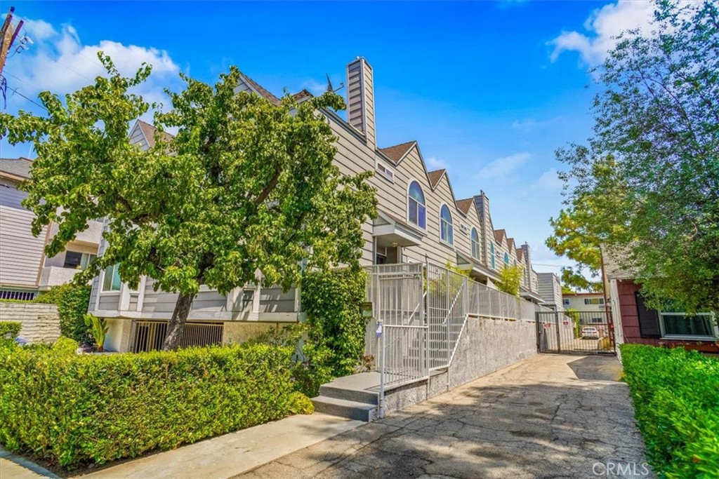 2+2.5+ two parking spaces underground. Valley Village Gated. Small complex. Unit is located in the back. Indoor laundry. Plantation shutters. Hardwood flooring. Ceiling fan. Balcony. Bathroom downstairs. Tile flooring. Each bedroom has their own bathrooms. walk in closet. Alder dual pane windows. Lots of storage. Ready to move in!