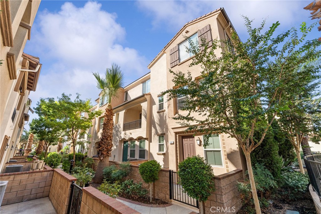 Welcome to this beautifully upgraded 3-bedroom, 2.5-bath corner-unit condo in Upland, built in 2017. This light-filled home features an open floor plan with luxury flooring, dual-pane windows, recessed lighting, and central heat and air. The modern kitchen includes granite countertops, a designer backsplash, and a large center island—ideal for cooking and entertaining. The spacious primary suite offers a private retreat, and the attached 2-car garage adds everyday convenience. Just outside is a playground, with access to resort-style amenities including a pool, clubhouse, and lush landscaping. Ideally located near parks, schools, shopping, and freeways, this move-in ready home combines comfort, style, and location. Appliances included.