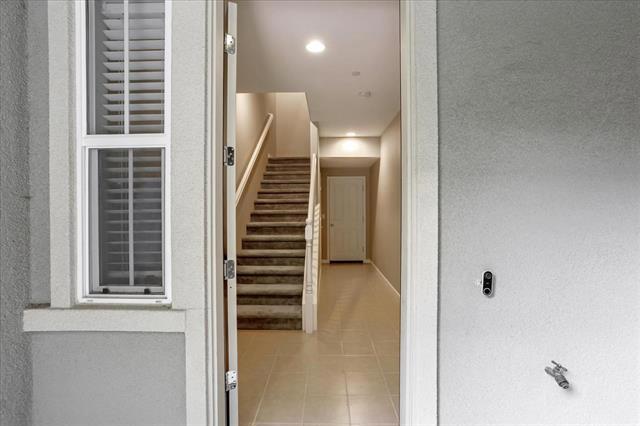 Beautiful Executive Style townhome property in the Coyote Creek Complex! Spacious 3 bedrooms 2 bathrooms, 11 years new! This home is available now for a quick move in, modern construction, full 2 car garage, tankless water heater, granite kitchen counter tops, gas cook top, indoor laundry room, washer and dryer included, private primary suite, balcony off living area, walk in closets in all bedrooms. Hardwood flooring, carpet in bedrooms, outstanding location for tech workers; walk to work! Complex has BBQ area, pool, gym, walking areas. 12 month lease, no smoking no pets, renter insurance required.