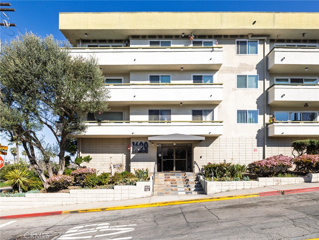 Experience the ultimate coastal lifestyle from this top-floor ocean-view condo, located in the heart of Hermosa Beach! Soak in the beautiful South Bay sunsets from the south-facing balcony that fills the home with natural light. Sliding doors open from the living space to the balcony to create seamless indoor/outdoor living. The kitchen, complete with a breakfast bar, opens effortlessly to the living and dining areas, making it ideal for casual meals or entertaining guests. The unit boasts two primary suites situated on opposite sides of the home for added privacy. Both are complete with their own bathrooms and one has a spacious walk-in closet. Enjoy the resort-style amenities in the community, including a pool, spa, sauna, gym and courtyard. Conveniently located across the street from a shopping center with Vons, Tesla chargers, shops, and restaurants, and just steps from the Greenbelt, beach, and pier, making every day feel like a vacation. Don’t miss the chance to embrace the best of the Hermosa Beach lifestyle!