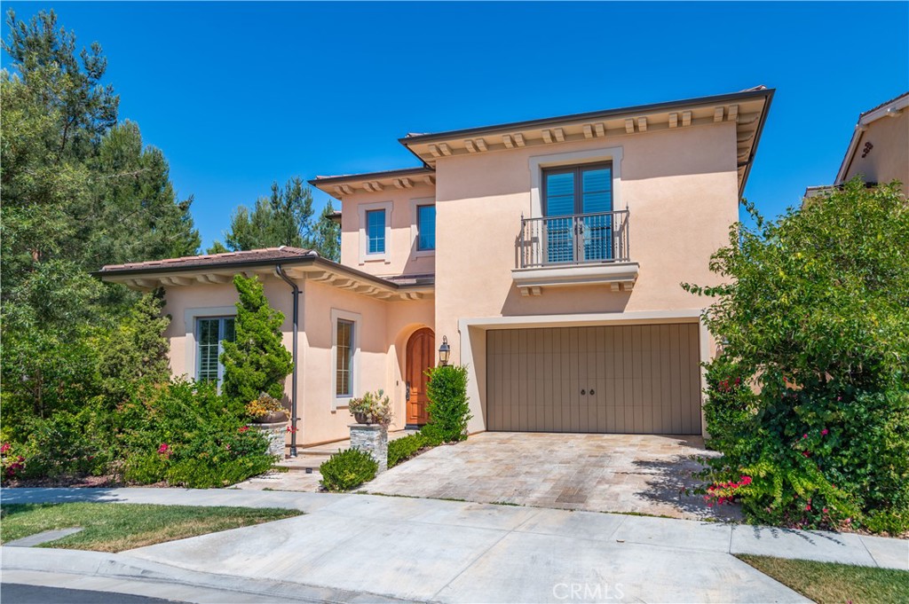 Discover the charm of 51 Thoroughbred, an exquisite, fully furnished 4 bedroom 3 bed residence nestled on a private cul-de-sac within the prestigious Strada community of Orchard Hills.
Step inside to discover soaring cathedral ceilings and an open-concept floor plan, creating an ideal setting for both daily living and sophisticated entertaining. The lower level is bathed in natural light, thanks to expansive glass doors and windows that offer serene views of the lush, beautifully landscaped back patio. This outdoor oasis features elegant travertine flooring, a tranquil water feature, and a built-in BBQ island with comfortable seating perfect for al fresco dining.
The well-appointed kitchen is a chef's delight, boasting a custom tile backsplash, a spacious center island with seating, premium KitchenAid appliances, and ample white, ceiling-height cabinetry. A convenient walk-in pantry completes this culinary haven. A versatile downstairs bedroom and full bathroom ensure comfort for guests or provide an ideal setup for multi-generational living.
Upstairs, a flexible loft space offers endless possibilities, whether you envision a playroom, den, home office, or dedicated workout area. The serene primary bedroom suite provides a peaceful retreat, featuring a custom-designed walk-in closet and a luxurious en-suite bathroom with a dual-sink vanity and a separate soaking tub. The upper level also includes a generously sized laundry room, two additional well-appointed bedrooms, and a full bathroom with a double-sink vanity.
This move-in ready home is enhanced with desirable features such as a reverse-osmosis filtration system in the kitchen, a whole-house water softener, automatic outdoor lighting and irrigation, stylish plantation shutters, and an epoxied garage with abundant built-in storage cabinets.
Residents of this community enjoy access to resort-style amenities, including sparkling swimming pools, relaxing spas, BBQ areas, basketball courts, and tot lots.
Conveniently located near the 5 FWY and Toll Roads, with a plethora of shopping and dining options at the nearby Market Place, and just minutes from top-rated schools within the award-winning Irvine Unified School District, including Northwood High School, 51 Thoroughbred truly offers the ultimate dream home experience. This cannot wait. Schedule your tour before its gone!