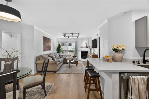 Photo of 5550 Owensmouth Ave #123, Woodland Hills, CA 91367 (MLS # SR26073255)