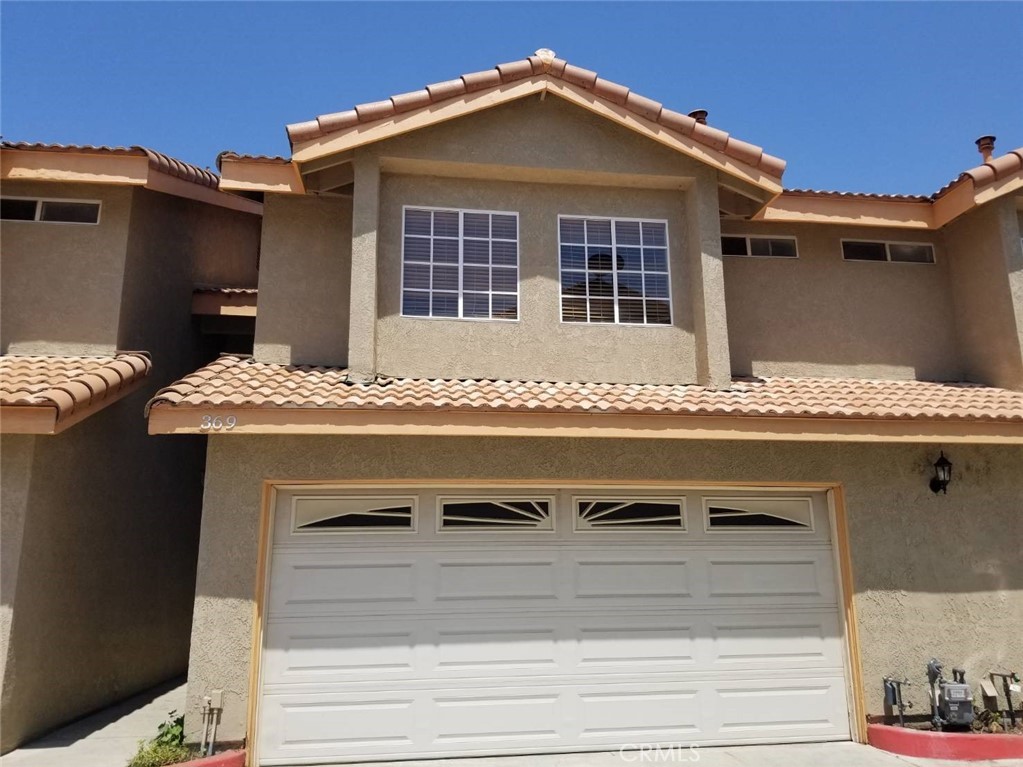 BEAUTIFUL TOWNHOME STYLE HOME LOCATED IN GATED COMMUNITY! EXTRAORDINARY AND AFFORDABLE CHNACE TO MOVE INTO A BEAUTOFUL HOME . Don't miss out on this very spacious 1,474 sq. ft. condo located inside a gated community! Features 3 bedrooms and 2.5 bathrooms with a 2 car garage that conveniently connects to the kitchen for easy unloading. All bedrooms upstairs including the spacious primary suite. Nice area. Gated Community. Close to parks, freeways, schools. Commercial center near by. Great Location!