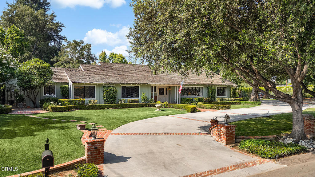 Welcome to a timeless retreat in the heart of Chapman Woods, where architectural pedigree meets lush California living. Designed by renowned architect Theodore Pletsch, this exceptional property awaits the fortunate new buyer's personal touches. Sited on over an acre on a flat corner lot, the home is a single level estate, with the exception of one bedroom with its own stairway and half bath, tucked away privately above the rest of the house. Built in 1952 by Altadena-based Pletsch, who was known for his sensitive indoor-outdoor designs, this residence is no exception. The home unfolds over 1.04 flat acre of celebration-worthy grounds. The main residence offers 6 bedrooms, 5 1/2 baths and the breezeway leads to an expansive 3-car garage. Inside, the layout flows with modernist intent, and there are serene views of the grounds at every turn, seamlessly blending interior comfort with the beautiful outdoor spaces. There are 3 fireplaces in the main house, a spacious family room, sunroom and the 6th bedroom is currently being used as a spacious laundry room. Outdoors, the sprawling corner lot is a sanctuary of its own-with a sparkling pool, two tranquil koi ponds, and even visiting ducks that return seasonally. In addition to the 3-car garage, there are brick and concrete driveways accessible from the front or side of the property. The park-like backyard feels like a resort. Host unforgettable celebrations under the stars in the built-in barbecue/ bar area or say 'I do' in a garden that feels lifted from a dream. The pool/ guest house adds versatility and is perfect for guests, creative studio use, or multi-generational living. It features a living room with built-in bookshelves and fireplace, its own entry, plus French doors that open to the pool and grounds, full kitchen, a large bedroom, generous closets and a 3/4 bathroom. 3350 Lombardy is truly a home for a lifetime, surrounded by other substantial and estate homes in this especially private pocket of esteemed Chapman Woods, yet just minutes from dining, shopping and schools. A home of rare provenance and possibility- where light, legacy and lifestyle come together.