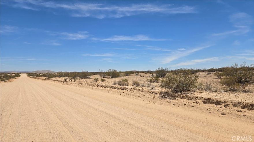 Massive 78.69± Acre parcel within the city limits of California City! This expansive, mostly-level acreage offers scenic views just a few miles from town. Convenient access via Randsburg Mojave Rd, which runs through the parcel, makes it easily reachable. Zoned for Open Space, Residential, and Agricultural use, the parcel is Industrial adjacent, which may present additional opportunities. Electricity is less than 1,000 feet away from the SE corner at 20 Mule Team Pkwy. This area is popular with outdoor enthusiasts because of the many OHV trails in the surrounding BLM lands and offers a lot of potential in the path of progress! *Buyer to make their own independent investigations regarding Zoning & General Plan Designations, Environmental & Hazard Zones, Access & Development Costs, Availability & Costs of Utilities.