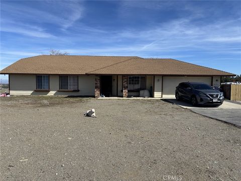 Photo of 9591 Colfax Road, Phelan, CA 92371 (MLS # DW26076134)