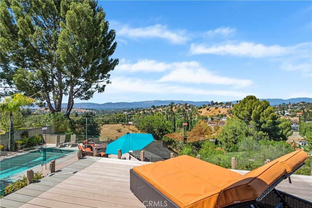 Photo of 21727 Ulmus Drive, Woodland Hills, CA 91364 (MLS # SR25199700)