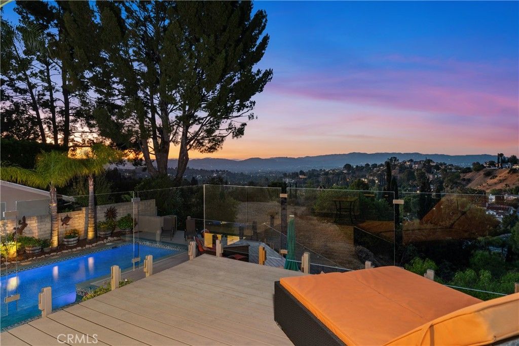 Photo of 21727 Ulmus Drive, Woodland Hills, CA 91364 (MLS # SR25199700)