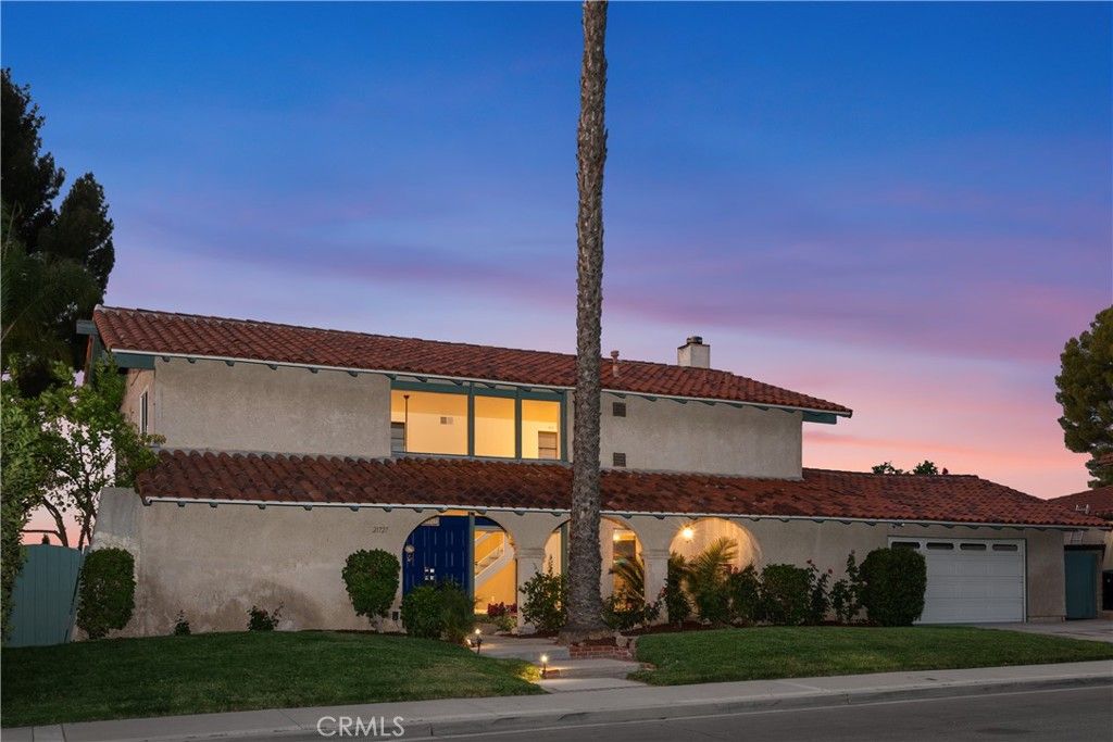 Photo of 21727 Ulmus Drive, Woodland Hills, CA 91364 (MLS # SR25199700)
