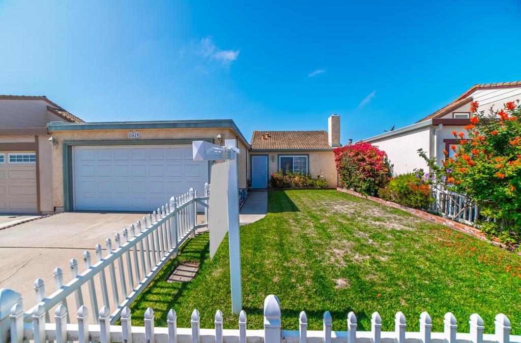 Welcome to this charming little quaint home located on the north side city of Salinas. With a comfortable 984 square feet of living space, this residence offers two cozy bedrooms, which both have sliding doors to the backyard, one full bathroom featuring a shower and tub, and a range of desirable amenities. The kitchen is well-equipped with modern conveniences, including an electric cooktop, built-in oven range, microwave, and refrigerator, all complemented by a practical Formica countertop. The flooring consists of carpet and vinyl/linoleum, providing both comfort and durability. The living area includes a fireplace, perfect for cozy evenings. Laundry facilities are conveniently located in the garage, which is equipped with electricity hookup (220V) and includes a washer and dryer. The home falls within the Salinas City Elementary School District. This home also also offers a 2 car garage with plenty of room for storage. This is a great starter home.