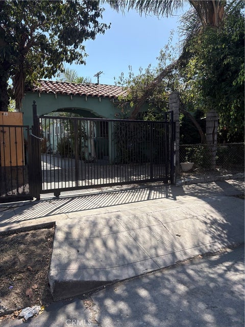 Photo of 450 E 70th ST, Los Angeles, CA 90003 (MLS # RS26212620)