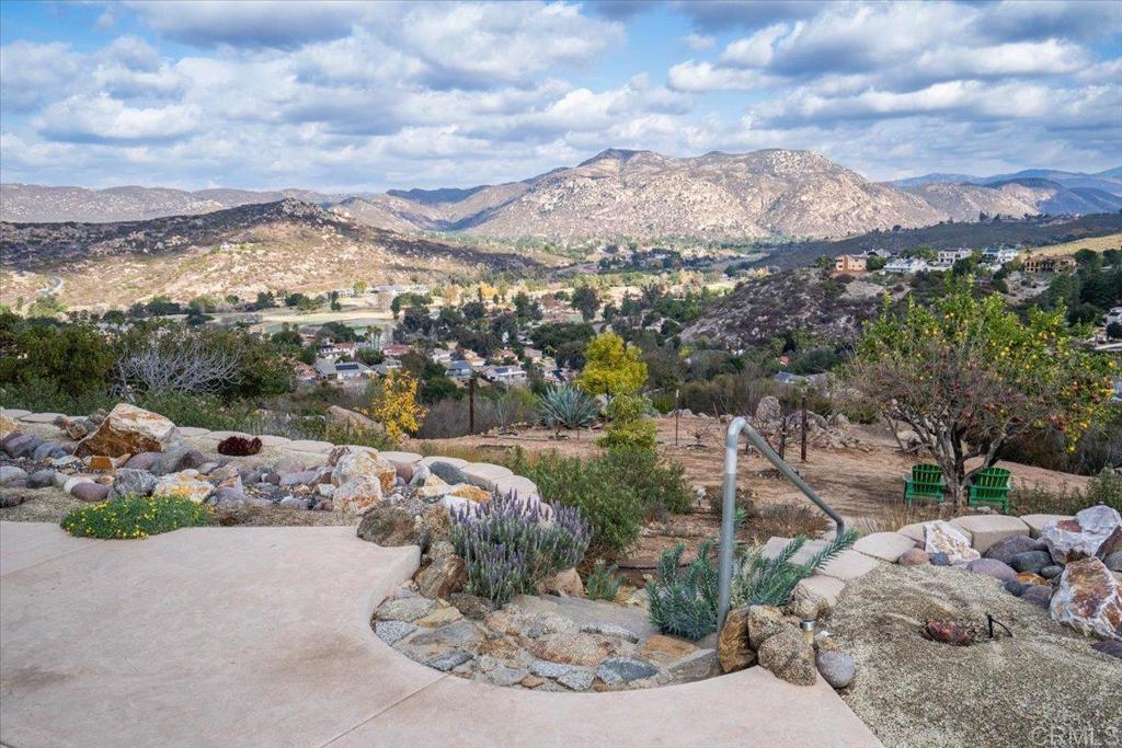 You won't believe the incredible, panoramic views in this quality custom home recently transformed by a master craftsman at the end of a sought after cul de sac. Formal marble entry with stunning views to the valley and snow capped peaks. Great room with vaulted, beamed ceilings and tons ofwindows make this home light and bright. Architectural details include stacked stone walls, wood plank flooring and barn doors. Island kitchen overlooking the view featuring Quartz counters. Dream primary suite and luxury bath. Extensive covered patio for entertaining.