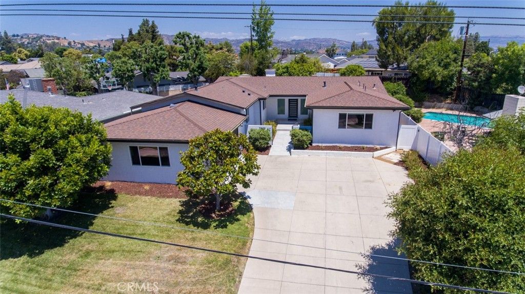 Photo of 23853 Hatteras Street St, Woodland Hills, CA 91367 (MLS # BB25208006)