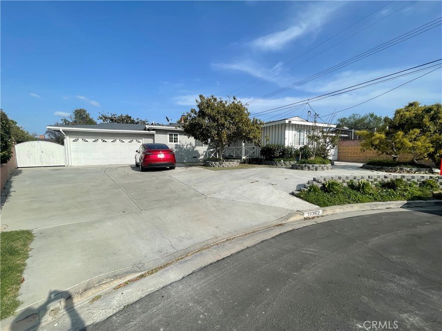 Welcome to your dream house in heart of Garden Grove centralized between Anaheim, Disneyland, Garden Grove, and Korean Town. This exceptional property offers not one, but two remarkable homes on a single lot, boasting a total of 8 bedrooms and 4 baths an unbeatable near the vibrant pulse of Garden Grove offer with two house on the one Big lot. Property features a NEWLY built 1200 Sqft ADU few months ago in 2023, which is fully permitted. Extend long driveway can park 6 cars, and 2 car garages. There are many fruit trees including avocado, apple and, citrus. Enjoy a sparkling safety swimming pool year round! Don't Miss out the Beautiful House within a big lot, and safety cul-de-sac with a huge lot 10112 Sqft. and 2 houses on the property. Features 2 separate addresses 12262 and 12266 Madras Pl, Garden Grove with a total of 8 beds, 4 full baths. Main house 1460 Sqft. and was recently remodeled completely. Including fixtures, flooring and paint throughout. Bathrooms are done with granite from floor to ceiling. Owner has fully approved plans for adding 2nd level. A New painting in and out side of the house. Putting new fences on the main house's patio, and the swimming. Putting nice bricks on the to patios. Cementing all around the house, paths, and expanding the front yard for more parking, land scape the paths along the ADU, paid off ADU's solar. All utilities are separated. Close to the Vietnamese Community, with access to the 22, 55, and 91 freeways. Nearby super markets, good schools, Shopping Mall and more. MUST SEE!!!