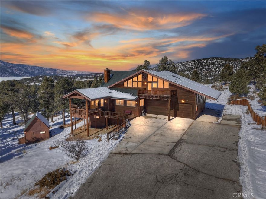 INCREDIBLE, TRANQUIL SETTING ON 10 ACRES! Just wait until you see the views and experience the

tranquil setting from this custom five-bedroom (or four-plus loft), four-bathroom ranch-style home all

on its own, private well. Measuring approximately 3,300 sq. ft., features include a wide open floor

plan, floor-to-ceiling rock fireplace in the living room AND a rock fireplace in the main bedroom, full

kitchen facilities with SS appliances including range, dishwasher, microwave, fridge, granite counters,

pantry, breakfast bar, ample dining area, central forced air heating, hickory wood flooring, full laundry

facilities with deep sink, vaulted ceilings, a three-car, attached garage, extensive redwood decking, a

three stall barn, (each with a separate corral), an attached tack room with 1/2 bath, hay-storage

shed, a riding arena and covered RV parking with hookups. All this sits on 10 wooded acres in the

middle of a pinion forest with views of the surrounding hills and Baldwin Valley. Extensive exterior

painting and staining work has just been completed. The perfect setup for equestrian use. Furnishings are negotiable.