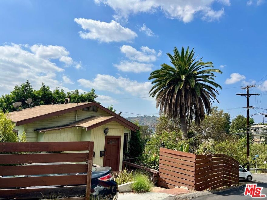 Tucked into the serene hills of Mt. Washington in Northeast LA, this charming bungalow duplex at 3634 and 3636 Roseview Ave offers an incredible blend of character, income potential, and development upside. Each of the two units features 2 bedrooms and 1 bath, totaling 1,232 sq ft of living space on a generous 8,813 sq ft lot. Both units enjoy beautiful hillside views, surrounded by mature trees and gently terraced yards, creating a peaceful, private setting. Live in one and rent the other, or reimagine the duplex as a 4-bedroom, 2-bath split-level single-family home, a flexible layout perfect for modern living. Currently, the property generates $6,000/month in rental income. Even more potential lies ahead: Ready to pull permits for two detached ADUs, each 1,037 sq ft, 2 stories, with 2 bedrooms and 2.5 bathrooms offering the opportunity to significantly expand living space or rental income. Set high in the hills, the lot offers breathtaking views of canyons, rolling hillsides, and the iconic Downtown LA skyline. One of the few remaining vacant parcels in this coveted neighborhood, it provides a unique chance to create a luxurious hillside retreat complete with the spectacle of Dodger Stadium fireworks lighting up your Friday nights. This property must be purchased with the adjacent vacant lot at 3628 Roseview Ave (6,480 sq ft), where the seller has started plans to build a 3,042 sq ft, 4-bedroom, 4-bath single-family home and a detached 800 sq ft, 1-bedroom, 1-bath ADU buyer to complete the process. This is a rare opportunity to develop a multi-structure hillside compound with panoramic views ideal for a family estate, a savvy investor, or an owner-user looking to live in one unit while offsetting costs through rental income. Don't miss this chance to create something truly special in one of LA's most sought-after neighborhoods.
