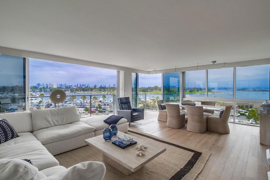 Located in the exclusive Coronado Shores complex, this beautifully remodeled 2-bedroom, 2-bathroom condo offers stunning panoramic views of the San Diego Bay. Designed with exquisite taste and attention to detail, the unit features a fully equipped luxury kitchen, high-end finishes throughout, and windows that open across the unit to invite in natural light and bay breeze. A private balcony provides the perfect space to relax and take in the views. Residents enjoy access to top-tier amenities including direct beach access, four oceanfront pools, tennis and pickleball courts, a clubhouse with gym and lounges, and expansive grassy areas for recreation. This is coastal living at its finest.