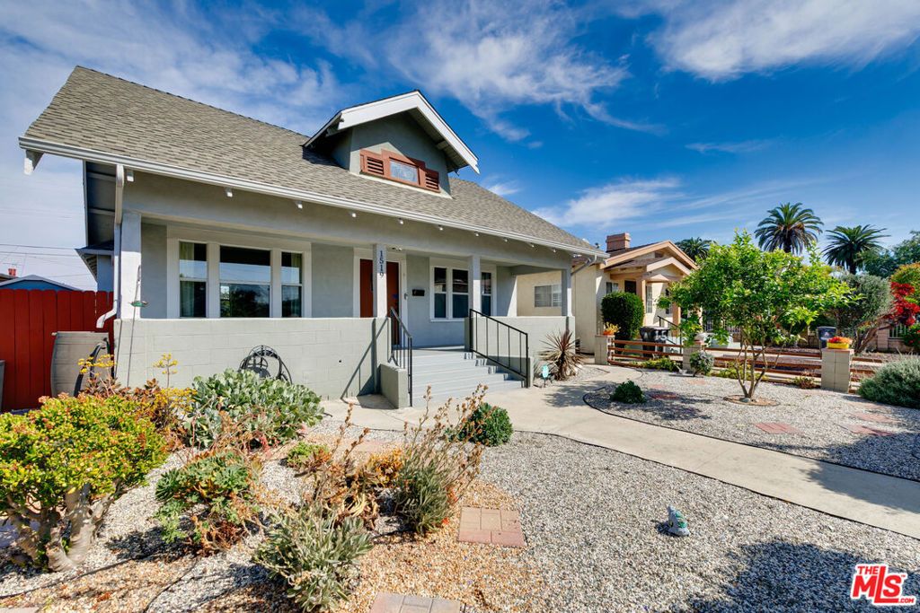 Photo of 1519 W 51st Place, Los Angeles, CA 90062 (MLS # 26660727)