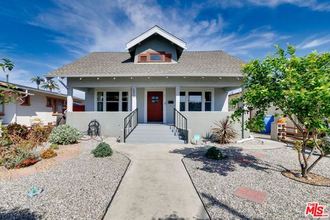 Photo of 1519 W 51st Place, Los Angeles, CA 90062 (MLS # 26660727)