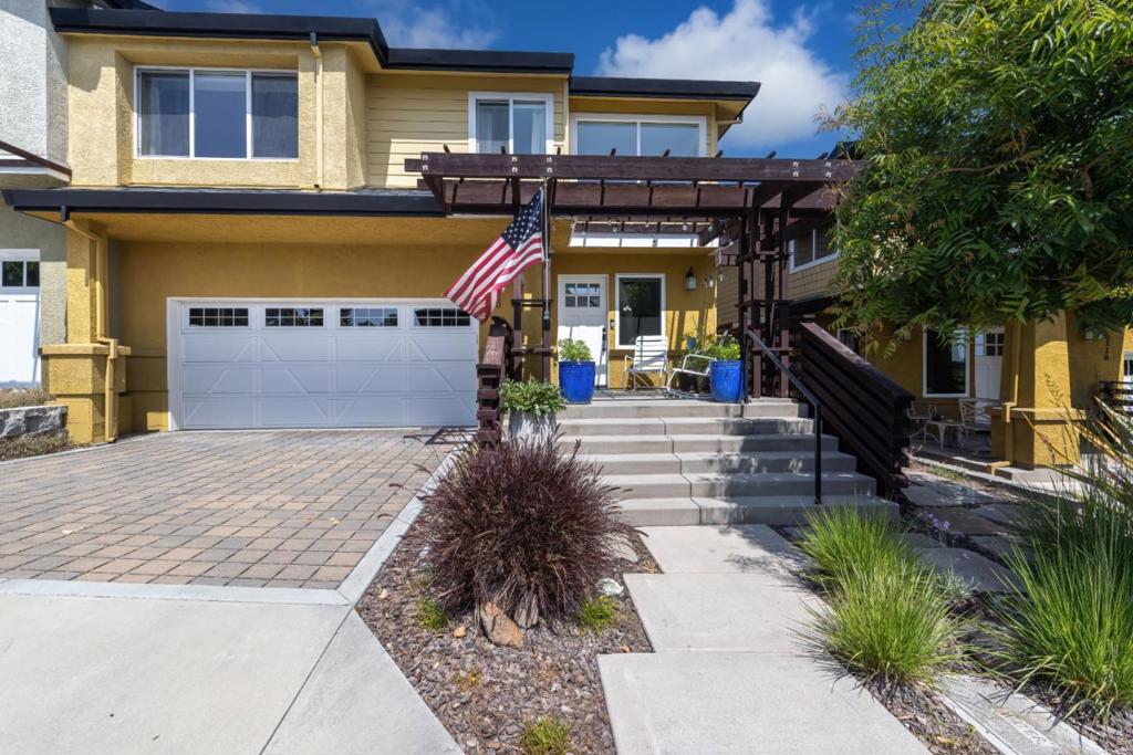 Charming 3-Bed, 2.5-Bath Townhouse in Prime Aptos Location! Beautifully maintained home near Capitola/Seabright Beaches, Cabrillo College, Nisene Marks hiking/biking trails. This spacious townhouse features Milgard French doors opening to a peaceful patio, Bali cellular blinds for privacy and efficiency, and custom closet organizers in bedrooms. The updated kitchen boasts quartz counters, upper glass-front cabinets, tile backsplash, new sink/faucet, and a 36" Proline ductless range hood, reverse osmosis water system under kitchen sink. Elegant chandeliers accent the primary bedroom, closet, and dining area. The updated half bath includes vanity, sink, and mirror. The private backyard has pavers, lush landscaping, and a power outlet for the fountain ideal for relaxing outdoors. A rare chance to enjoy upgraded coastal living in a sought-after community!