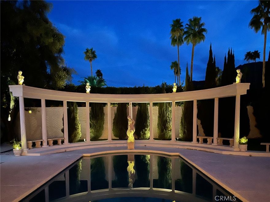 Step into a time capsule of mid-century modern perfection in the heart of Palm Springs! Designed by renowned architect John Outcalt, this 1965 gem on a 14,000 s.f. lot blends retro sophistication with seamless indoor-outdoor living. Just three blocks from downtown in the coveted Historic Tennis Club district, it offers stunning views of the San Jacinto Mountains. Beyond the double-door entry, an extra-large sunken living room welcomes you with a dramatic floor-to-ceiling marble fireplace, higher ceilings, and walls of glass. Original terrazzo flooring leads to the dining area, perfectly positioned next to a fabulous vintage wet bar. The adjacent kitchen features a walk-in pantry and a separate laundry area. Two oversized primary suites offer vintage luxury with terrazzo-clad baths, sunken tubs, and private patios. A third bedroom—ideal as a media room or guest retreat—includes twin beds, a desk area, and its own terrazzo shower/tub combo. Sliding glass doors in every bedroom open to the sun-drenched pool deck, where a sparkling pool, lounge space, and breathtaking mountain views create a dreamy retreat. Private patios, an attached two-car garage, 3 cabanas and an unbeatable location near top restaurants, the Agua Caliente spa, Palm Springs Art Museum, and the famous Thursday night street fair complete this timeless escape. Select furnishings are available for purchase to keep the vintage vibes alive.  Furnishings available for purchase.