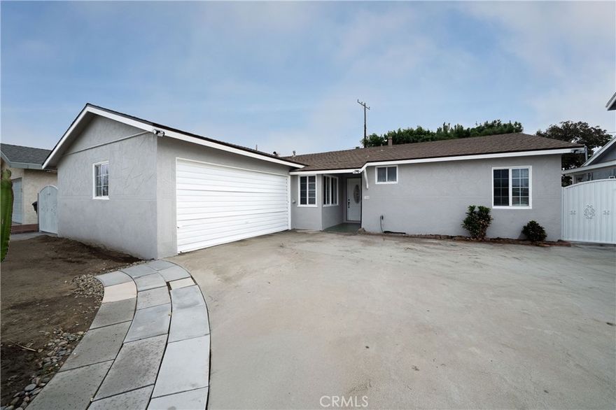 A must-see, move-in-ready home in an excellent area of Anaheim! This property includes 4 bedrooms, 1.5 bathrooms, and over 1,283 sq. ft. of living space. Features include new roof, new exterior paint, tile flooring throughout (with carpet in two bedrooms), a spacious living room, granite kitchen countertops. Extra-long long driveway that allows for RV access or plenty of parking. Walking distance to schools, parks, and stores. Conveniently located near the 5 and 91 freeways. Front door faces East/West.