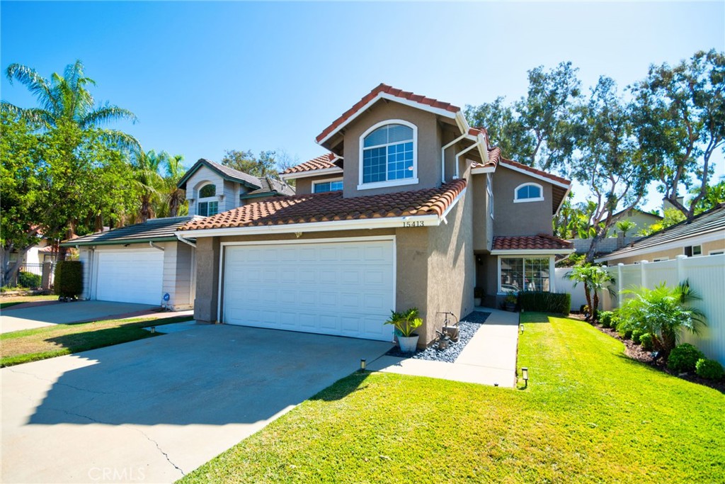 Tastefully updated home in the desirable Village Oaks community of Chino Hills! Nestled on a quiet cul-de-sac, this residence features soaring double-height ceilings in the spacious living and dining rooms, filled with natural light from large picture windows and overlooking the serene backyard. The remodeled kitchen offers quartz countertops, shaker cabinets, and stainless steel appliances, with a powder room conveniently located on the main floor. Upstairs, the primary suite boasts vaulted ceilings and an expansive bathroom with dual sinks, abundant counter space, a soaking tub, and a separate shower. Two additional bedrooms, including one with a charming round-top window and window seat, share a full hall bath, complemented by an office nook ideal for work or study. A private backyard patio creates the perfect setting for entertaining or relaxing outdoors. Additional highlights include an attached two-car garage, low-maintenance landscaping, and a prime location minutes from Costco, Trader Joe’s, H-Mart, 99 Ranch, Seagull Supermarket, and Chino Hills Spectrum, plus walking distance to Oak Ridge Elementary School and two parks.