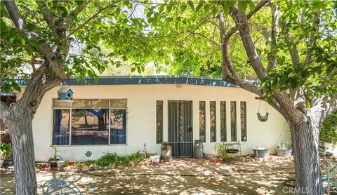 Photo of 1471 Cherokee Trl, Yucca Valley, CA 92284 (MLS # JT26094474)