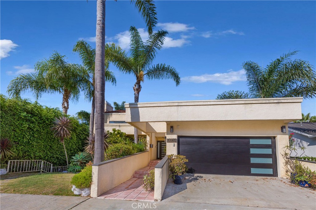 Welcome home to this fabulous custom house built in 1988! This unique property offers a multilevel home with the most amazing views from just about every window. There is a wonderful a step-up living room with a cozy fireplace, formal dining room, an enclosed sun room, and a wrap around balcony off of the family room. The beautifully appointed chef's kitchen comes with stainless steel appliances including a newer refrigerator. All bedrooms are located downstairs and the large primary suite offers a grand wardrobe and en suite bathroom with a separate tub and shower. This well-cared for home also offers two custom skylights, central air and heat, and a laundry room that comes equipped with a washer and dryer. With many popular eateries and amenities within walking distance, the home has easy access to the 90 and 405 freeways, and is close to LAX. Utilities will be paid separately, but will be billed at the same amount each month. Tenant responsible for internet & cable. HURRY! Won't last!