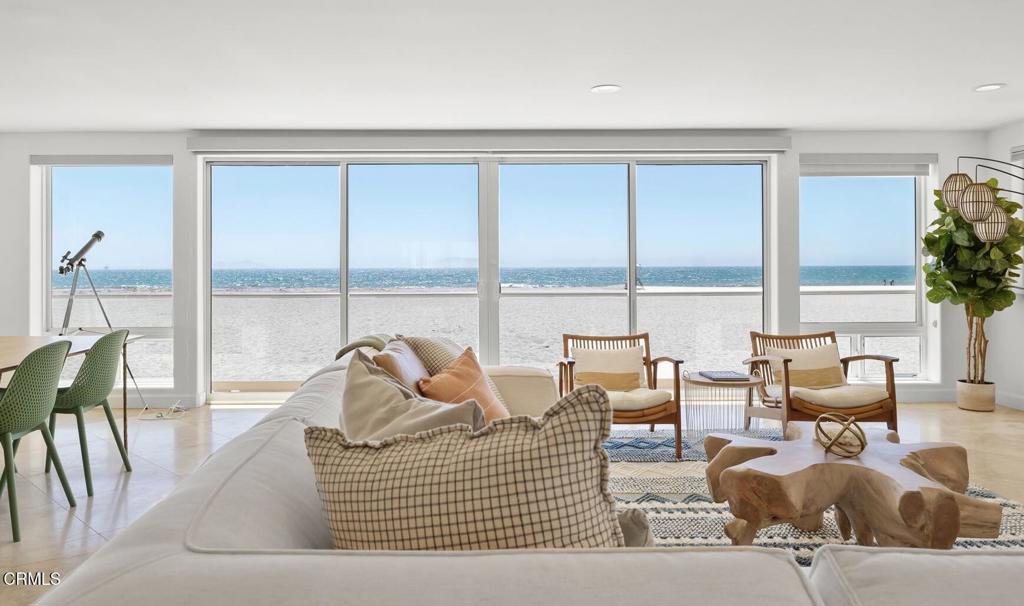 Stunning and spacious beachfront home with three levels of oceanfront living and fantastic views of the blue Pacific and the Channel Islands. Built in 2007 with more than 3,800 square feet, there are four bedrooms, three full baths and a powder room. Two bedrooms are on the first level along with a wet bar, providing easy access while enjoying a day on the beach. The second level features a spectacular great room with unbelievable views, a space for gathering with a view balcony, a dining area, and a kitchen with a breakfast bar open to a family room. On the third level, two large bedrooms with en suite baths include the ocean front primary, complete with a fireplace in the retreat and a view balcony, as well as the oversized second bedroom with en suite bath. Travertine flooring, glass and chrome accents and high windows provide a modern flair. The home is equipped with a newer boiler that combines with a radiant floor heating system for those cooler coastal evenings. Prime Hollywood Beach location near lifeguard station 2! Surf, swim, collect seaglass, and enjoy the sunsets! The Channel Islands Harbor, with water sports, dining, retail and entertainment, is nearby. This spectacular oceanfront is a dream Southern California beach retreat! Move in today, entertain tonight!
