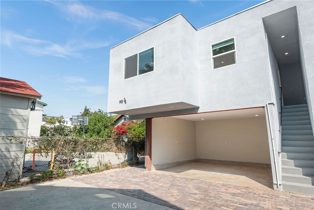 SECTION 8 AND HOUSING VOUCHERS WELCOME! Experience modern urban living at 145 E 36th Pl in this a NEWLY CONSTRUCTED residence featuring a bright open layout, stylish white-shaker kitchen with quartz counters and stainless-steel appliances, warm wood-style floors, and a striking black spiral staircase. Enjoy private outdoor space with brick-paver patio and secure fencing, all within minutes of Downtown LA, USC, and major freeways. This ADU is walking distance to Superior Grocers with convenient access to Metro bus lines and the 110 Freeway.