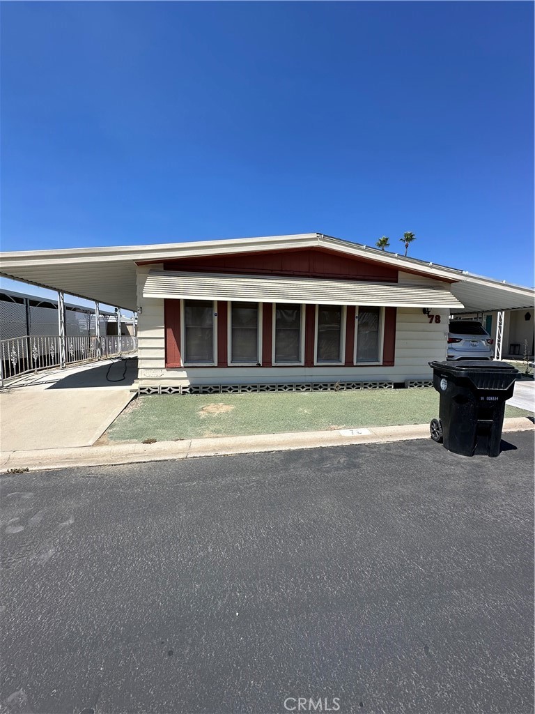 Calling all Mobile Home Investors, This one is for you. Located in the highly desirable 55+ community of the Colonial Country Club, a resort lifestyle community where free golf is just one of the many perks of living here. This double wide home offers an open and spacious floor plan with central heating and A/C , Demo work has already done down to the studs, can lighting already started and is a blank canvas ready for your renovations. This is a 2 bedroom 2 bathroom golf course home, no steps to get into the home. Beautiful beamed ceilings as you walk into the home, with mountains views and the sprawling golf course. Beyond the covered carport is a wonderful shed that is perfect for storage. The Colonial Country Club community offers a wealth of amenities, including an 18-Hole Executive Golf Course, Year-Round Swimming Pool and Spa, Indoor Shuffleboard Courts, Billiards Room, On-Site Hair Salon, Ballroom, Fitness Center, Horseshoe Pits, pickle ball courts and even a dog park. You're conveniently located just minutes away from major shopping, restaurants, banks, and medical offices. Palm Springs is a mere 30-minute drive, and you're only 5 minutes from Diamond Valley Lake. For wine enthusiasts, Temecula's award-winning wineries are just a 20-minute journey away.