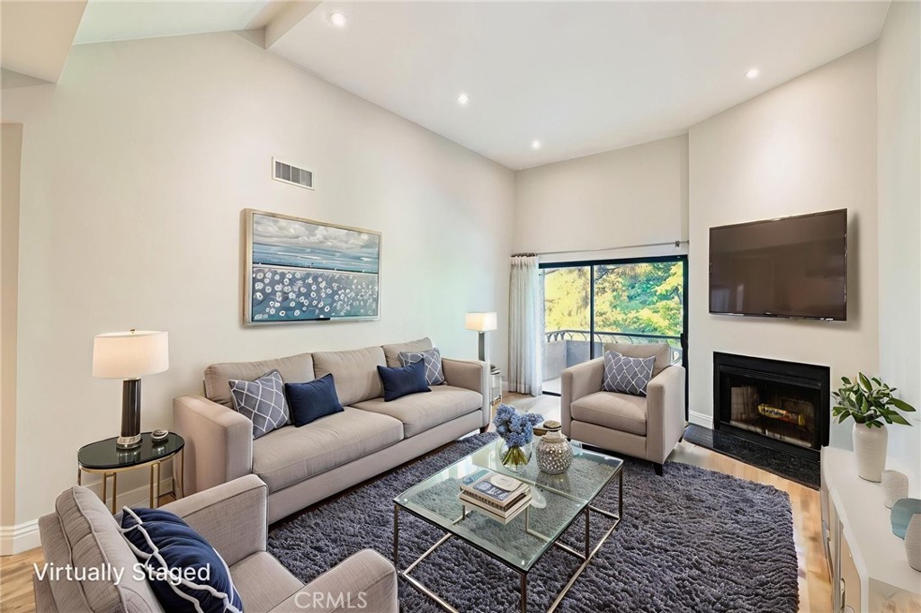 Welcome Home to 4280 Via Arbolada #201! Tucked away in the highly coveted, serene hilltop enclave of Monterey Hills, this stunning top-floor, front-facing corner unit is located in the beautifully maintained Wilson Summit community, one of the area’s most desirable complexes. This spacious 2-bedroom, 2-bathroom condominium checks every box. Two primary suites each feature walk-in closets and en-suite bathrooms. Vaulted ceilings and an open floor plan create a light, airy feel. In-unit laundry with washer and dryer is included. The updated kitchen offers newer appliances, including the refrigerator. Fresh interior paint and stylish, newer flooring run throughout. All walls have been skim coated (smooth), and recessed lighting has been added throughout. Central air conditioning provides year-round comfort. A private balcony with storage delivers scenic views from both bedrooms and the living room. Parking is easy with two side-by-side spaces in the secured, gated garage. The Wilson Summit community offers resort-style amenities, including a sparkling pool, spa, and sauna, a clubhouse and scenic walking paths, and secure, gated entry and parking. Enjoy peaceful living with convenient access to all that Los Angeles has to offer. Minutes from Downtown LA, South Pasadena, Highland Park, Dodger Stadium, and nearby parks, this central location blends tranquility with urban accessibility. Units in Wilson Summit rarely come on the market—don’t miss this opportunity to own a prime piece of Monterey Hills living!