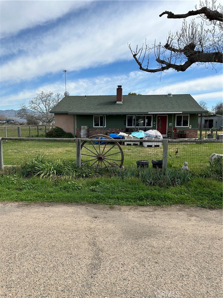 Rare 2 acre parcel with 3 bedroom 2 bath home. Completely updated 11 years ago including new roof. Separate building with many uses. Chicken coops and fencing for animals.