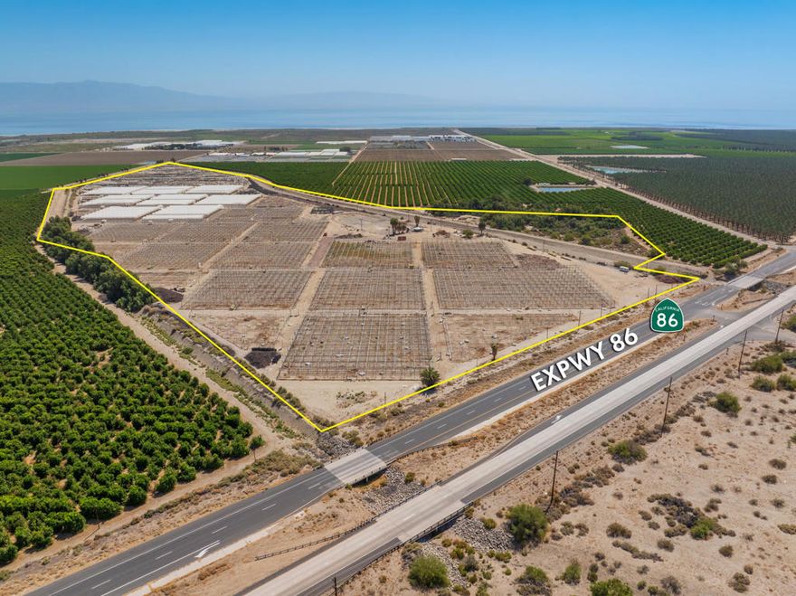 71 acres in warm Oasis area on two parcels. Structured greenhouses with adaptable irrigation system and fertigation system. Includes reverse osmosis station. Low cost abundant Coachella Valley Water District (CVWD) irrigation water, well, and reservoir with pump. Approximately 860 ft of frontage on Expressway 86. In Federal Opportunity Zone, with potential for tax benefits. Partially in Agricultural Preserve, which maintains low property taxes.