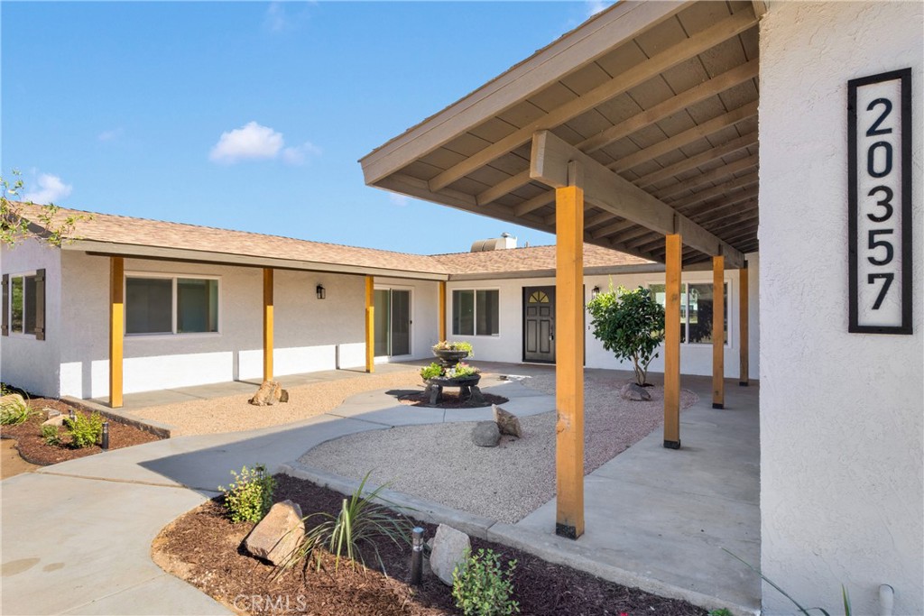 Fully Remodeled Home in Apple Valley in the Sunset Hills neighborhood! Welcome to this beautifully remodeled home featuring a charming and unique front courtyard—perfect for enjoying beautiful High Desert summer nights. As you enter, you’ll step into a spacious open-concept living and dining area that flows seamlessly into a stunning large kitchen and inviting family room—ideal for movie nights and entertaining. The kitchen includes an oversized pantry with a built-in prep area, functioning like a butler’s pantry for added convenience and organization. The home offers generously sized bedrooms, providing comfort and space for the whole family.
Create your own retreat with a private patio in the master. Situated on nearly a full acre of flat, usable land with RV access, this property has endless potential to create your own desert oasis in the backyard. Whether you envision a pool, garden, workshop, horses or play area—this lot can handle it all. DON'T MISS IT!