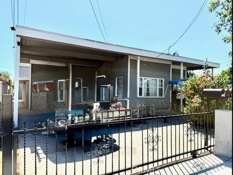 Photo of 8746 Chester Street, Paramount, CA 90723 (MLS # RS25200270)